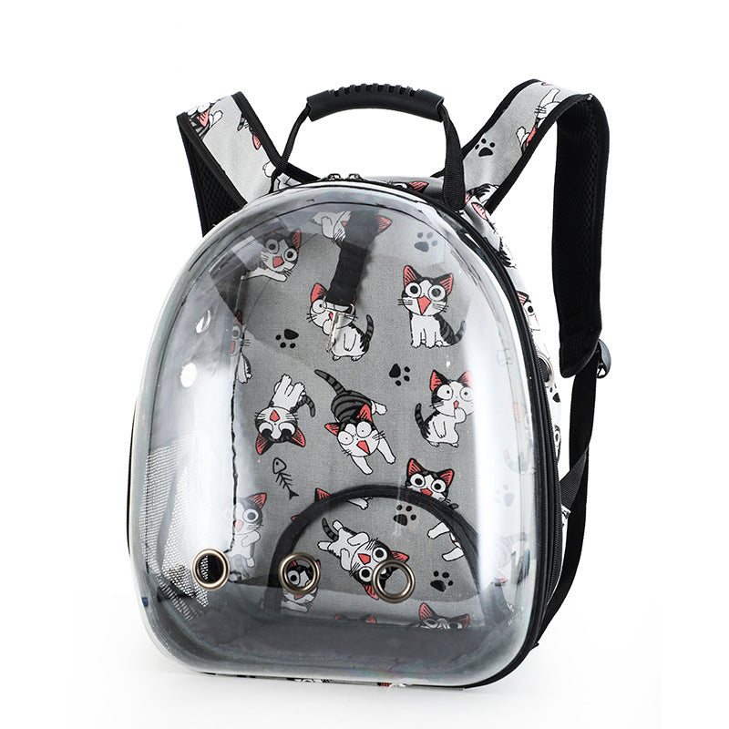 Introducing the Clear Cat and Dog Carrier Backpack: This gray backpack with a cartoon cat print is designed as a breathable pet carrier, featuring a transparent dome-shaped front window with ventilation holes and black padded shoulder straps—making it an ideal choice for traveling with your pet.