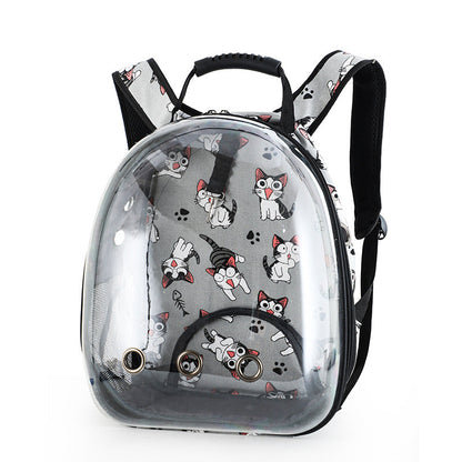 Introducing the Clear Cat and Dog Carrier Backpack: This gray backpack with a cartoon cat print is designed as a breathable pet carrier, featuring a transparent dome-shaped front window with ventilation holes and black padded shoulder straps—making it an ideal choice for traveling with your pet.