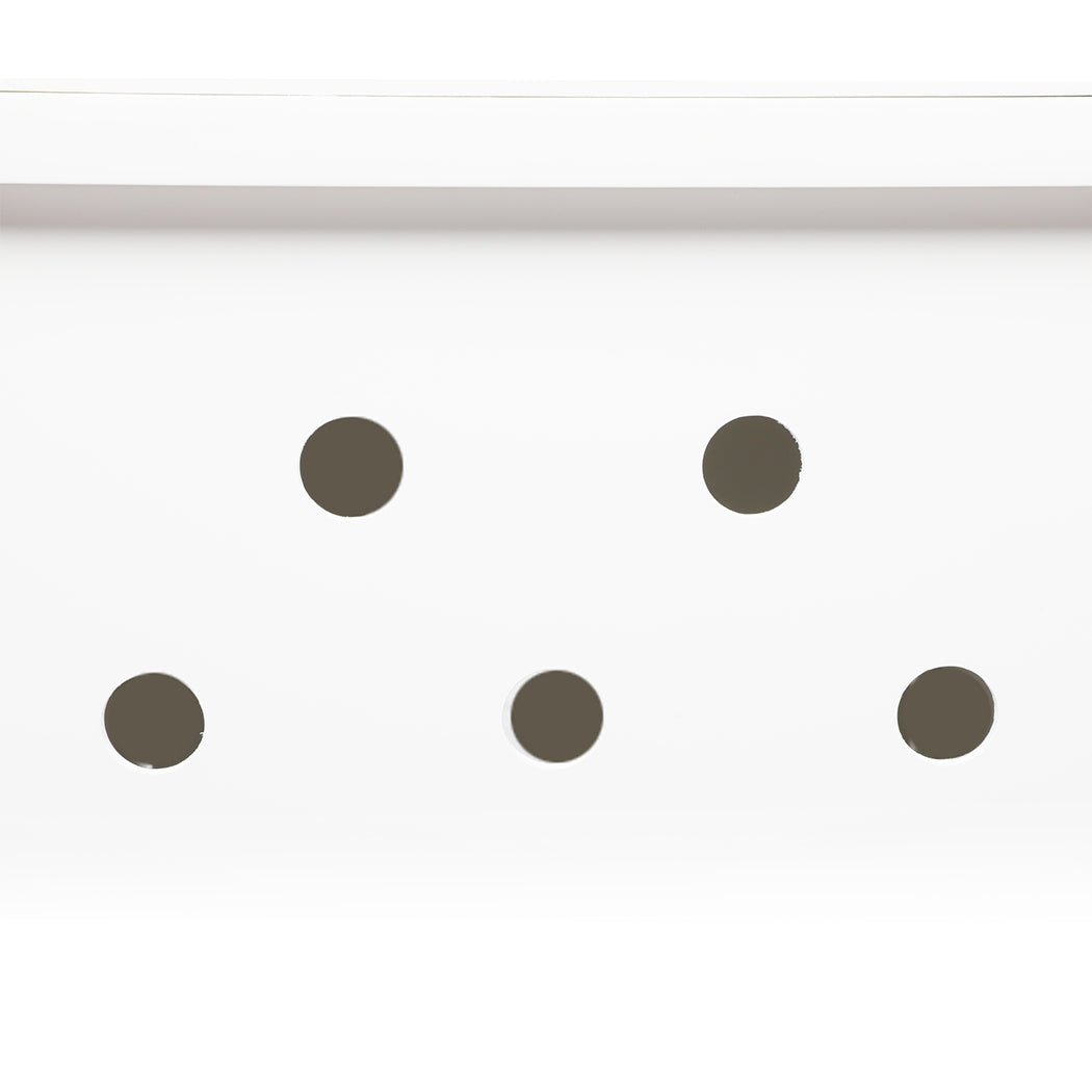 Five black dots arranged like the number five on a die, set against a plain white background—evoking the understated yet chic design elements seen in the PaWz Cat Litter Box Mat Fully Enclosed, a modern cat litter box enclosure that also doubles as a side table.